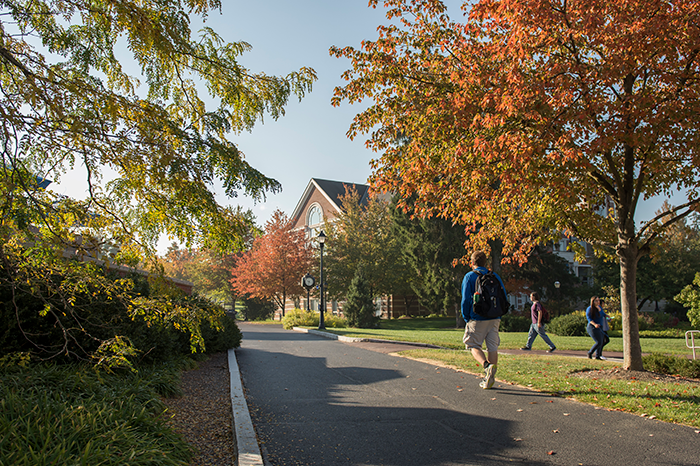 Students walking on campus in the Fall